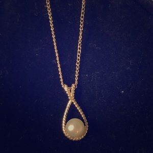Gold chain with pearl pendant